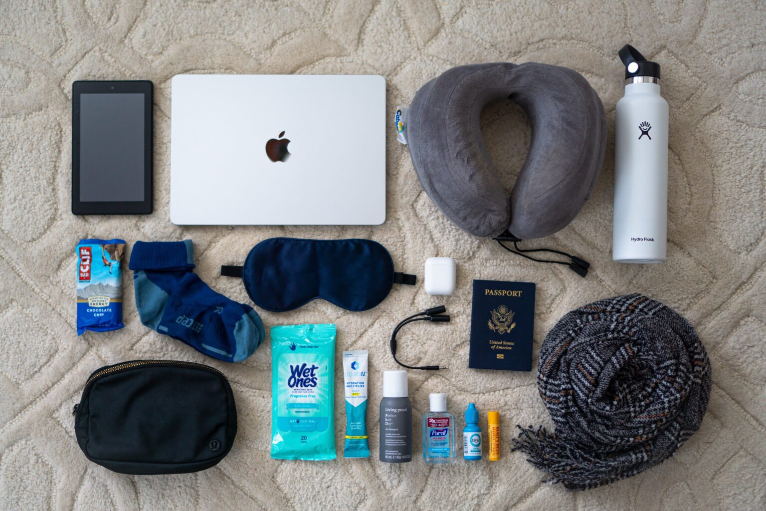 30 MustHave CarryOn Essentials for Long Flights Well Read Travels